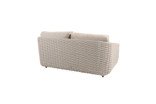 Das 4Seasons Lounge-Set Casanova Rope Latte von Zeo Living ist ein gewebtes beiges Outdoor-Sofa mit Seilmuster und wetterfesten Kissen, von hinten vor einem weißen Hintergrund abgebildet.