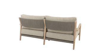 Rückansicht des 4Seasons Lounge-Sets Julia, ein Zweisitzer-Sofa mit hellem Teakholzrahmen und beigen Kissen, ideal für jedes Lounge-Set, isoliert auf Weiß.