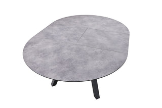 Von oben betrachtet verfügt der Kettler Ausziehtisch 120/170x120cm über eine ovale, graue HPL-Oberfläche und schwarz pulverbeschichtete Aluminiumbeine.